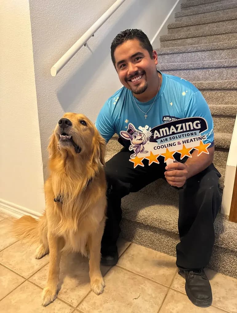 Amazing Air Solutions technician with a friendly dog, trusted in your home